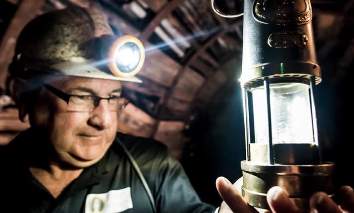 Your guide, a former miner who worked in the coal mines of the Rhondda Valleys, will take you underground and back in time.